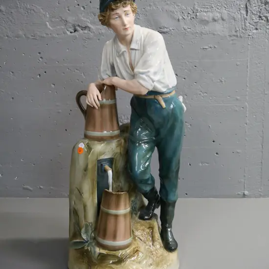 large Royal Dux figure - man at water pump H-610 W-230 at base