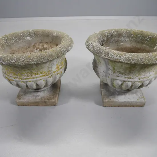 pair of cast concrete garden urns - one has chip to rim H-300 Diameter 360