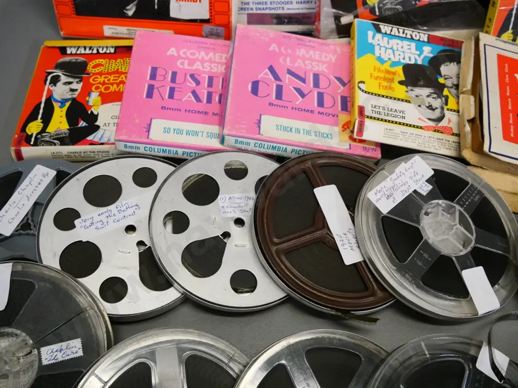 large assortment of 8mm and Super 8 cine films - Charlie Chaplin, Buster Keaton, Mickey Mouse etc. some w/original boxes Image 1++