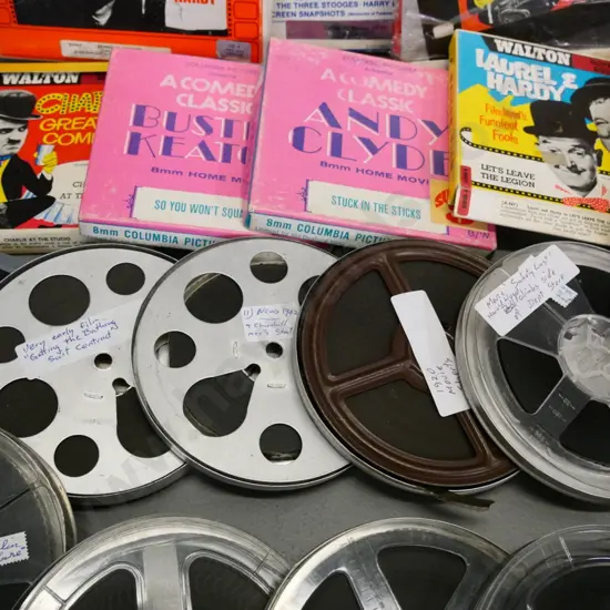 large assortment of 8mm and Super 8 cine films - Charlie Chaplin, Buster Keaton, Mickey Mouse etc. some w/original boxes