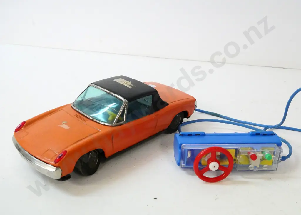 Banani Japan remote control (Triumph?) car - takes C-size batteries, untested no returns. sticker residue L-220 Image 1++
