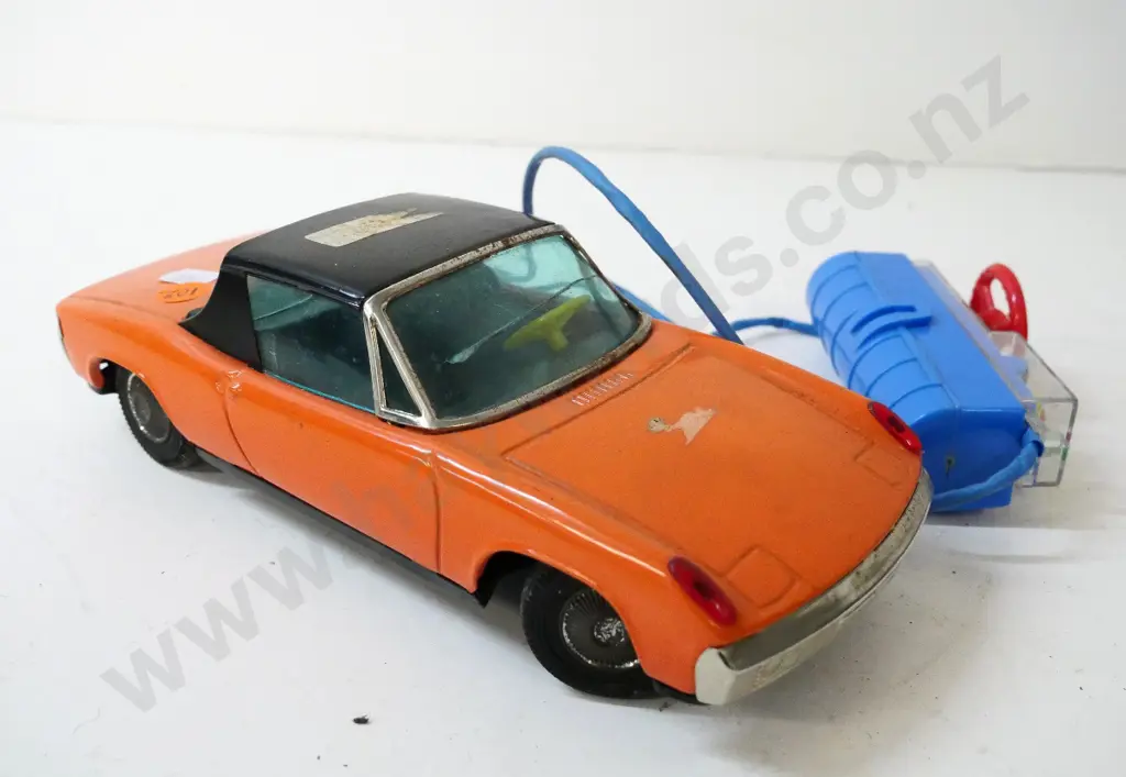 Banani Japan remote control (Triumph?) car - takes C-size batteries, untested no returns. sticker residue L-220 Image 1++