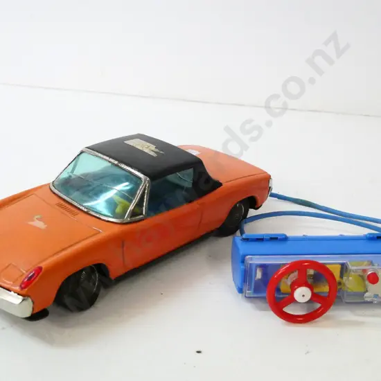 Banani Japan remote control (Triumph?) car - takes C-size batteries, untested no returns. sticker residue L-220
