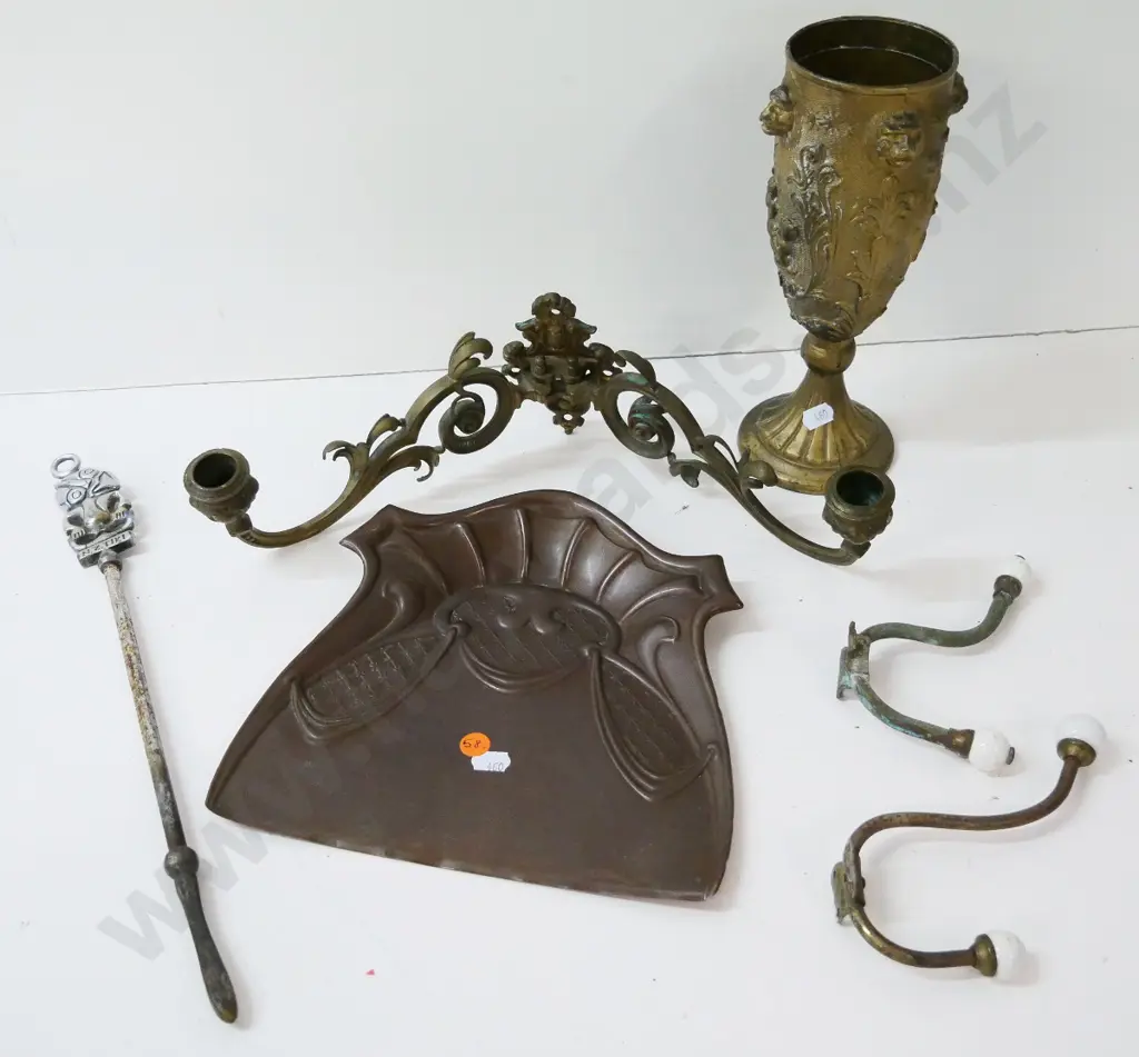 vintage metal items - brass vase, 2 coat hooks with porcelain knobs, copper crumb tray, NZ theme poker Image 1++
