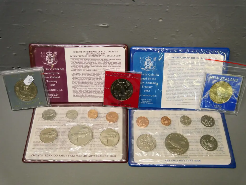 2 New Zealand coin sets - 1982 souvenir and 1983 50th anniversary of coinage - and 3 individual dollars 1982 & 83 Image 1++