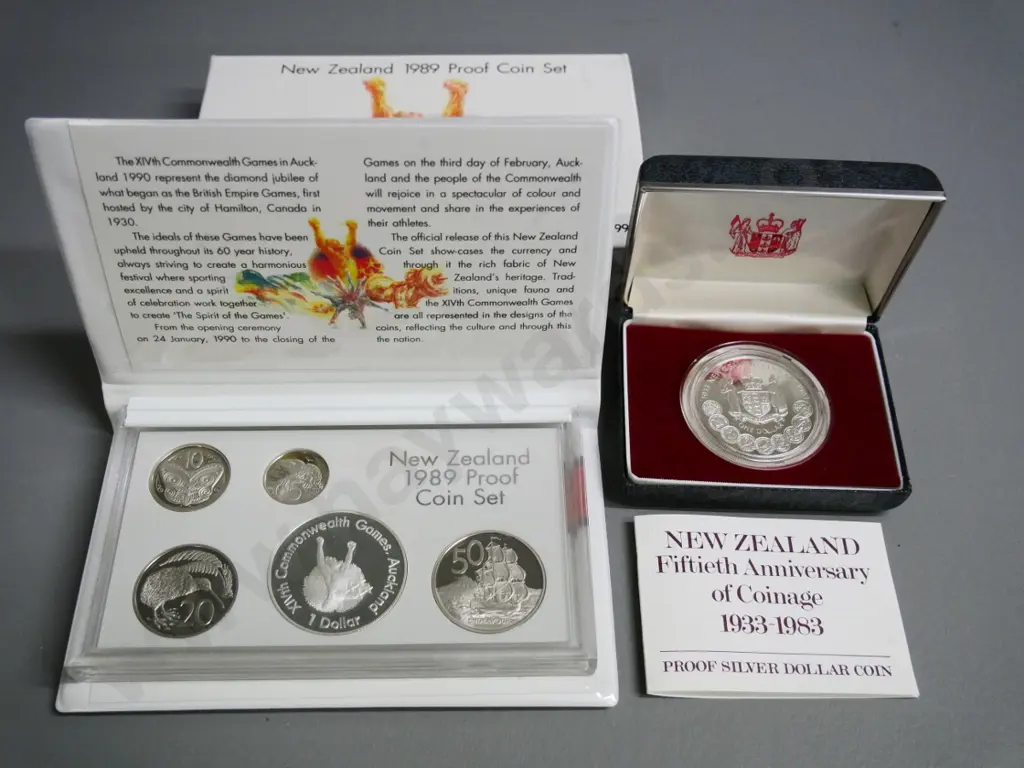 New Zealand collector coins - cased 1983 50th anniversary of coinage and 1989 cased proof set Commonwealth Games Image 1++