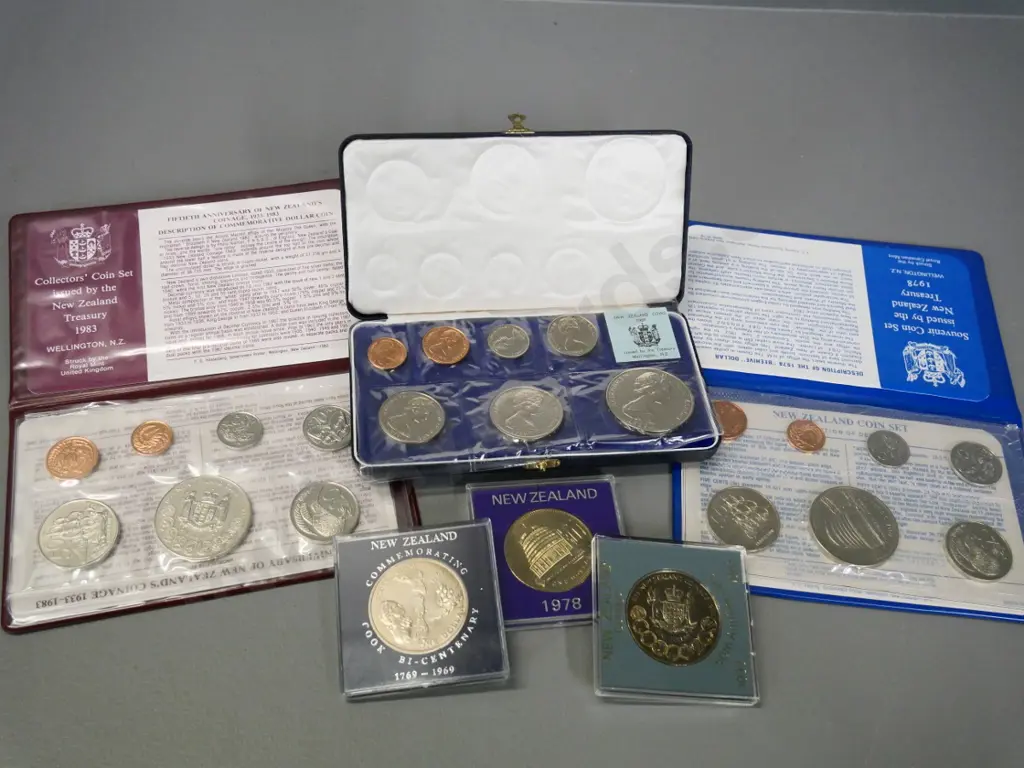 3 New Zealand collector coins: 1969 cased polished grade set, 1978 and 1983 souvenir sets, cased dollars for each year Image 1++