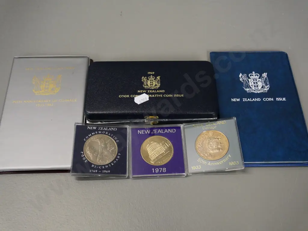 3 New Zealand collector coins: 1969 cased polished grade set, 1978 and 1983 souvenir sets, cased dollars for each year Image 1++