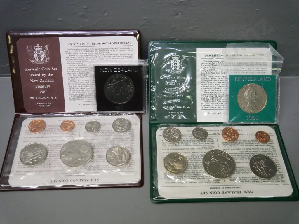 Cased New Zealand coin sets - 1980 and 1981 - souvenir sets with dollar and individual dollars Image 1++