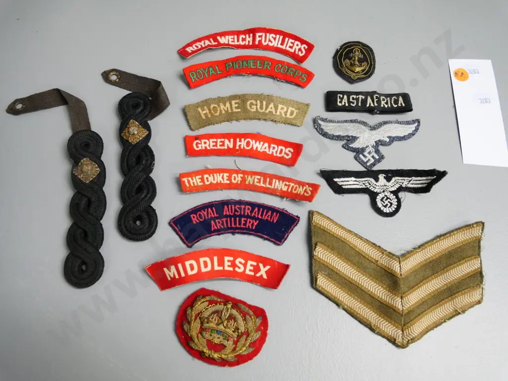 assorted military cloth cap and shoulder badges, stripes and epaulettes - British, German, Australian, etc. Image 1++