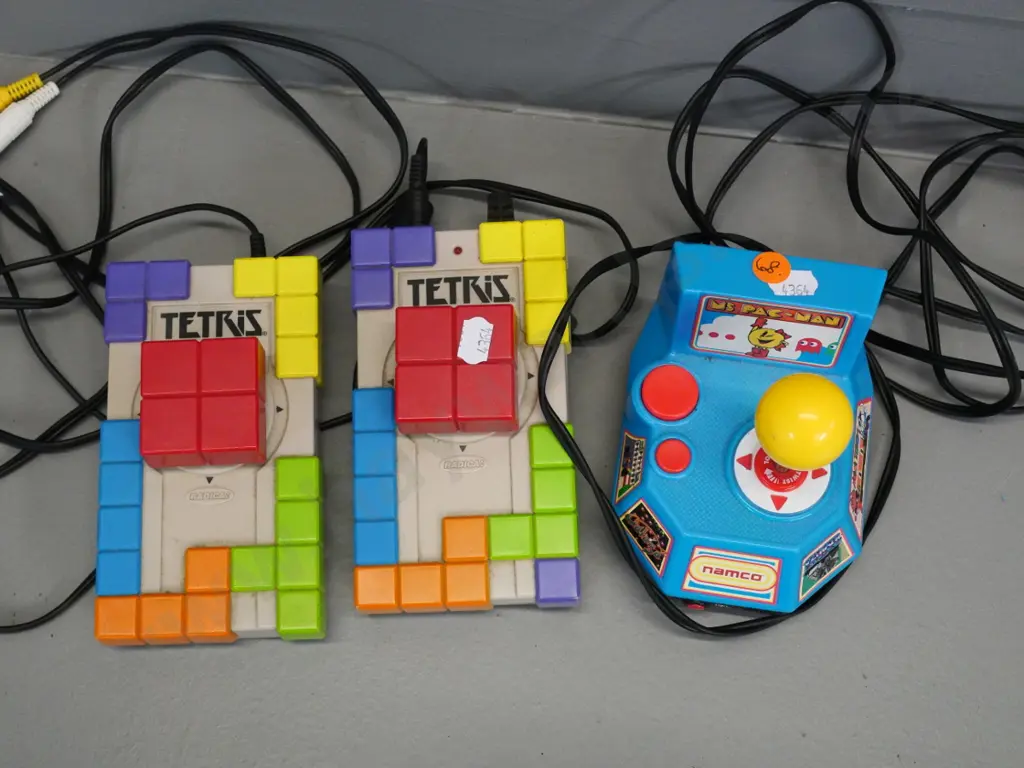 2 retro style plug-in TV video games - Radica Tetris with 2 controllers and a Nemco Ms. Pacman untested no returns Image 1++