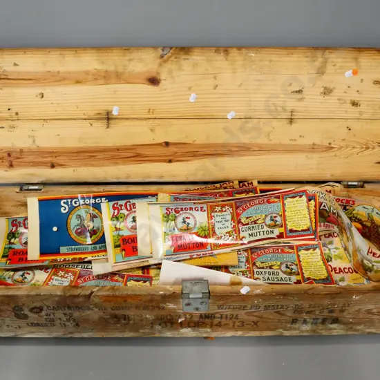 large wooden ammunition crate filled with assorted vintage labels