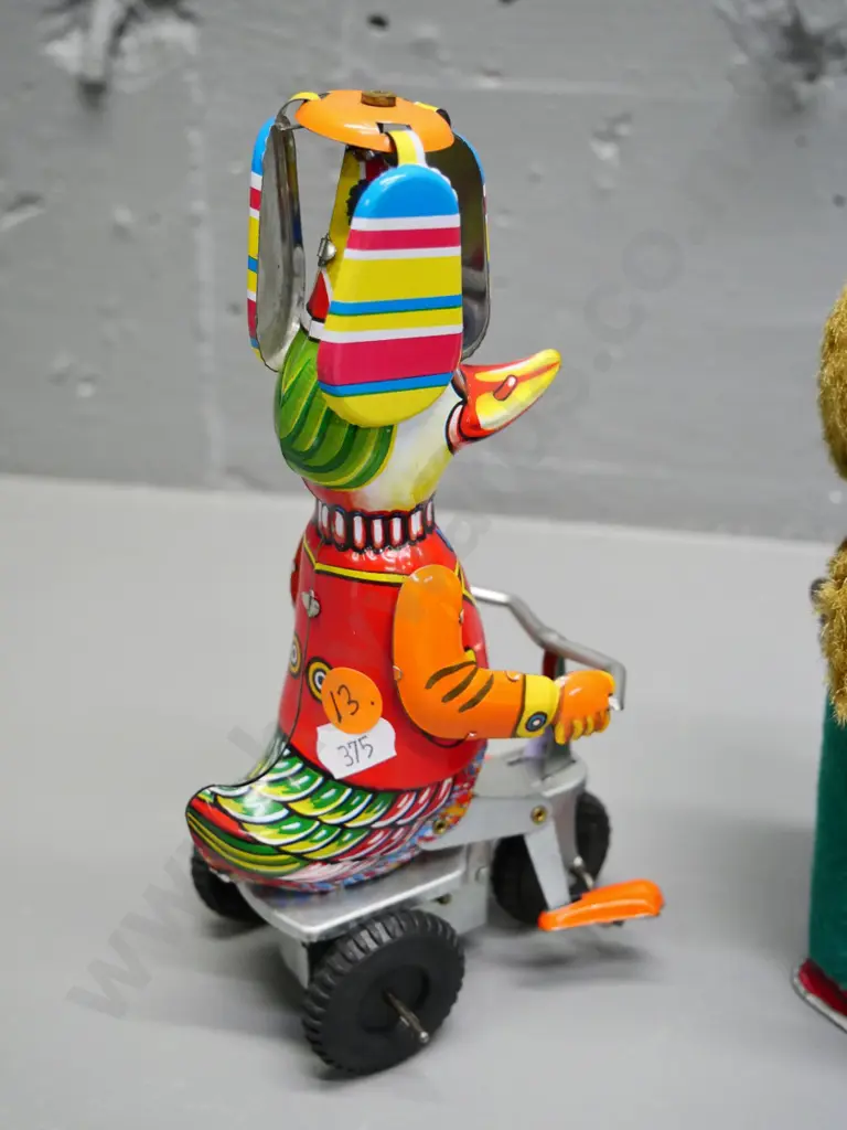 two wind-up tin toys - retro page-turning bear (not working) and reproduction duck - going, H-200 Image 1++