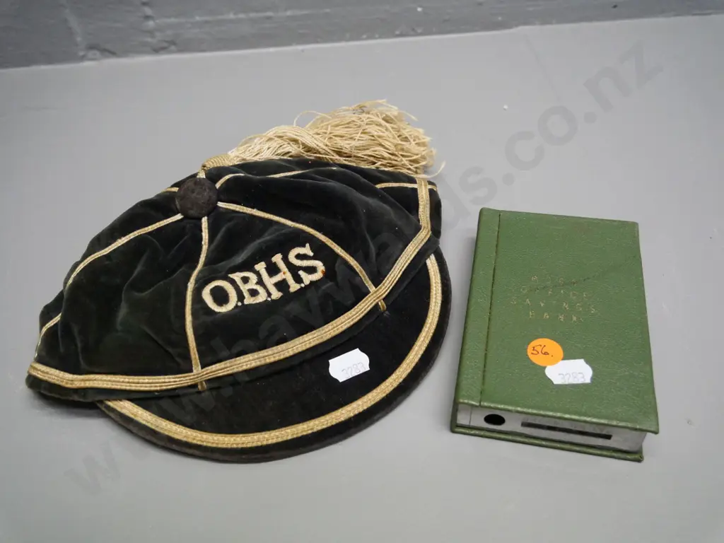 vintage post-office savings bank money box, wear to decoration, and Otago Boys High blues cap made by Ballantynes Image 1++
