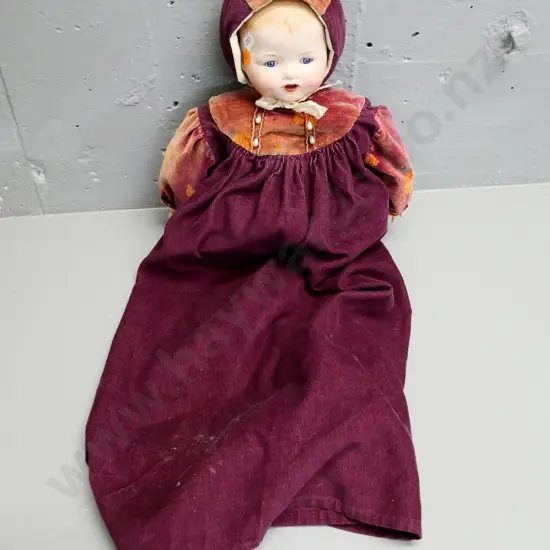 vintage doll with china head and hands, cloth body, has repair to one finger H-350