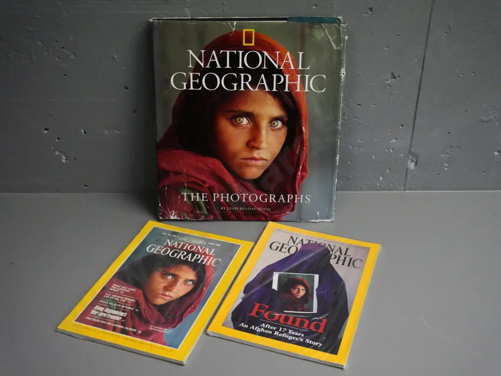 National Geographic Steve McCurry items: original 1985 "Afghan Girl" issue, 2002 follow-up & photo book, damage to cover Image 1++