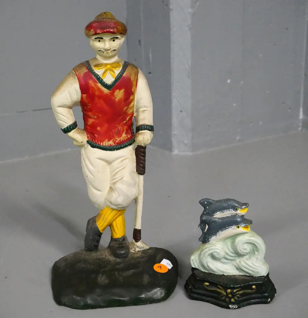 2 painted cast iron door stops - golfer H-260 and a small one with 2 leaping dolphins Image 1++