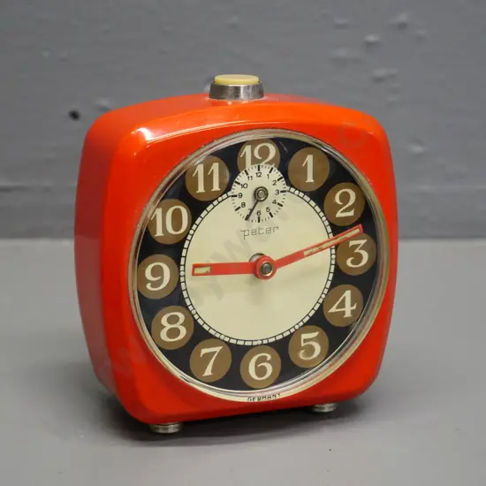 retro Peter orange metal-cased wind-up alarm clock H-100 W-85