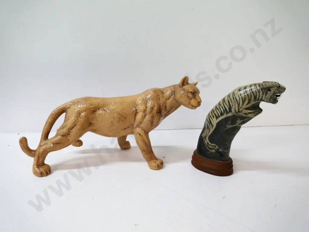 porcelain mountain lion figure H-190 L-370, no maker's mark, and a carved horn tiger on wooden base Image 1++