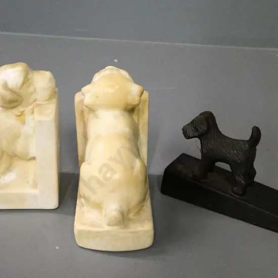 cast metal dog theme door wedge stop and a pair of ceramic book-ends H-120
