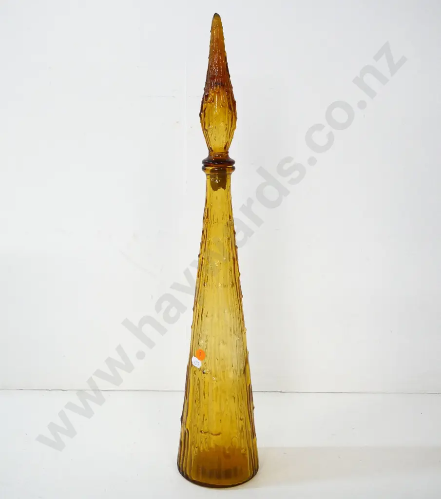amber glass genie bottle - tiny chip to tip of stopper, plastic surround missing H-570 Image 1++