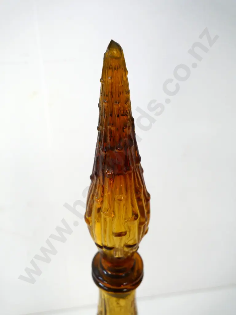 amber glass genie bottle - tiny chip to tip of stopper, plastic surround missing H-570 Image 1++