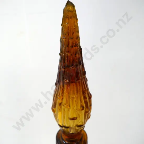 amber glass genie bottle - tiny chip to tip of stopper, plastic surround missing H-570
