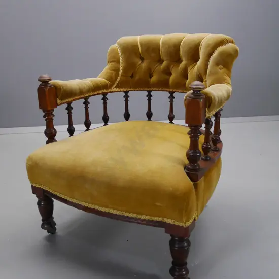 spindle back tub chair with deep-button back, gold velvet upholstery, original metal casters H-740 W-620 D-620