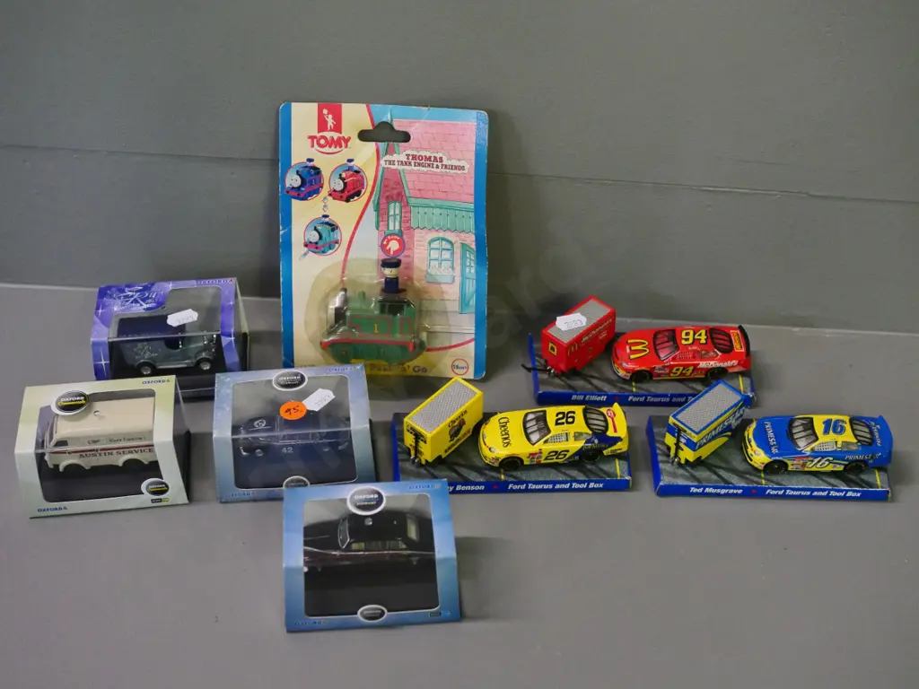 assorted die-cast vehicles - 4 boxed Oxford classics, 3 racing team sets, and plastic Thomas the Tank Engine Image 1++