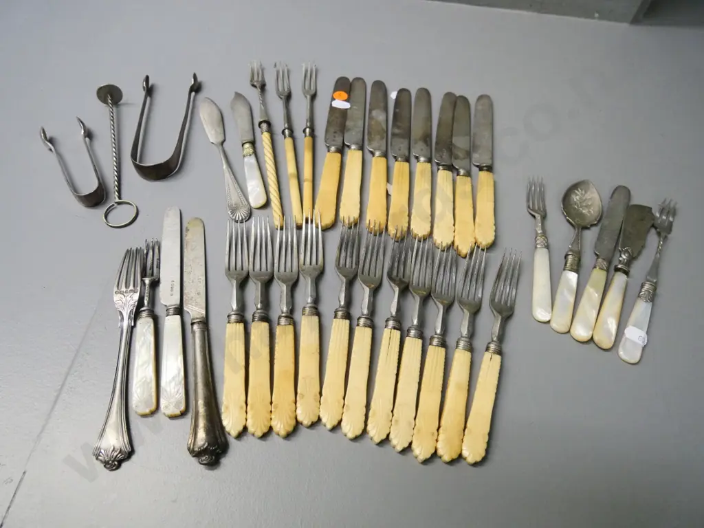 assorted vintage cutlery - some with mother of pearl, bone or composite handles - 5 pieces are sterling Image 1++