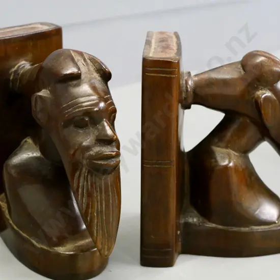 pair of hand-carved hardwood book-ends - African tribal style heads H-170 W-100 D-150