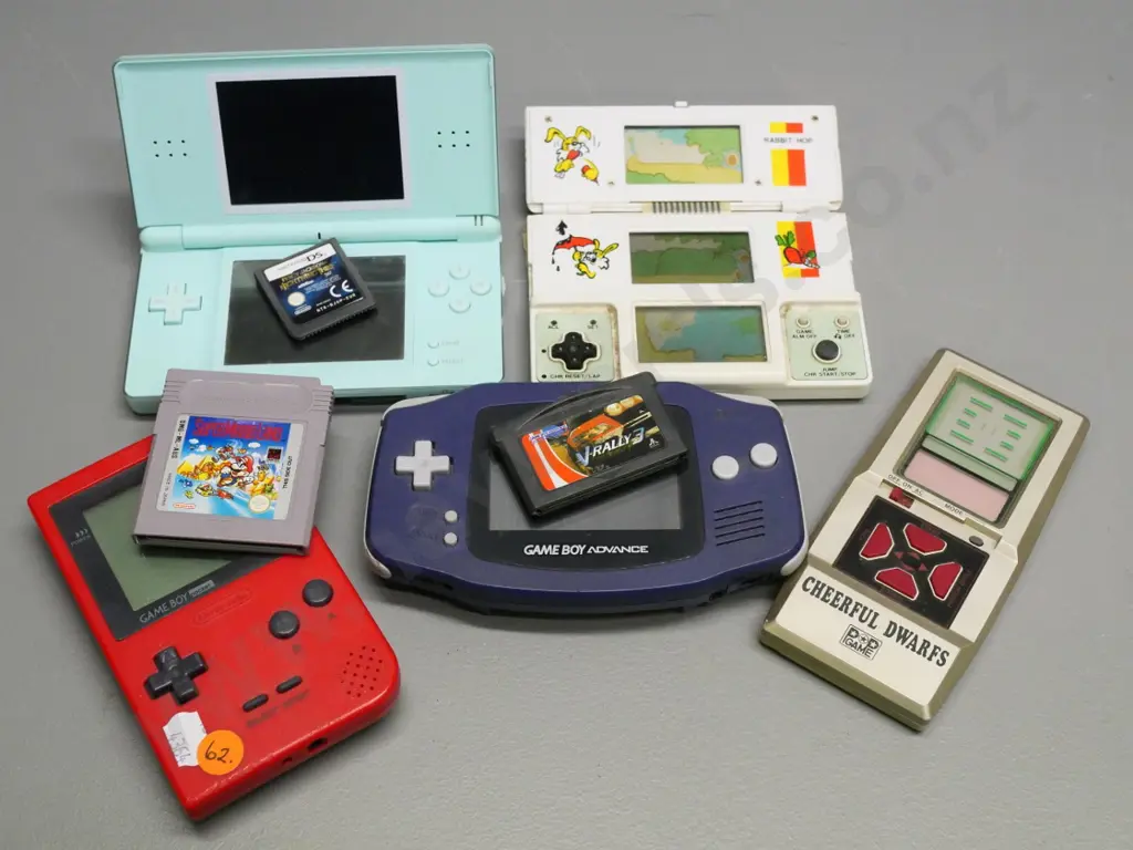 assorted hand-held video games and cartridges - Nintendo DS, Gameboy Advance etc. - untested, no returns Image 1++