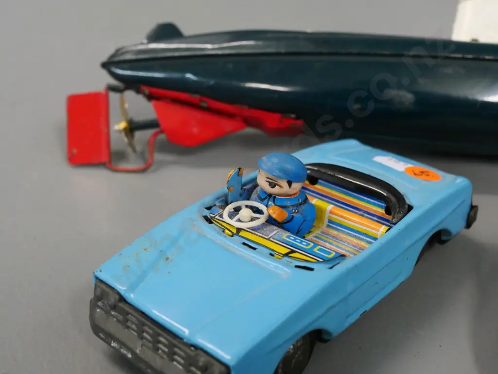 3 retro tin toy vehicles - friction drive Milky Way boat and car with waving driver, submarine may have missing parts Image 1++