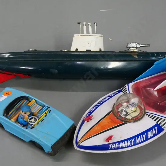 3 retro tin toy vehicles - friction drive Milky Way boat and car with waving driver, submarine may have missing parts