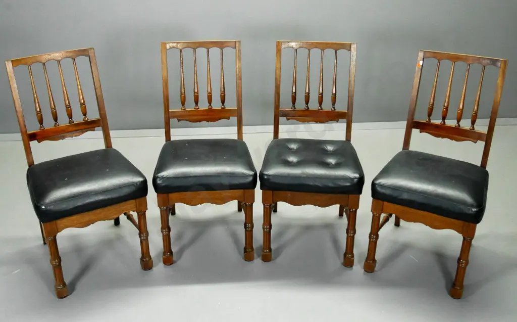 set of 4 mahogany splindle-back dining chairs with fluted legs, vinyl upholstered seats, buttons missing on 3 H900 W450 Image 1++