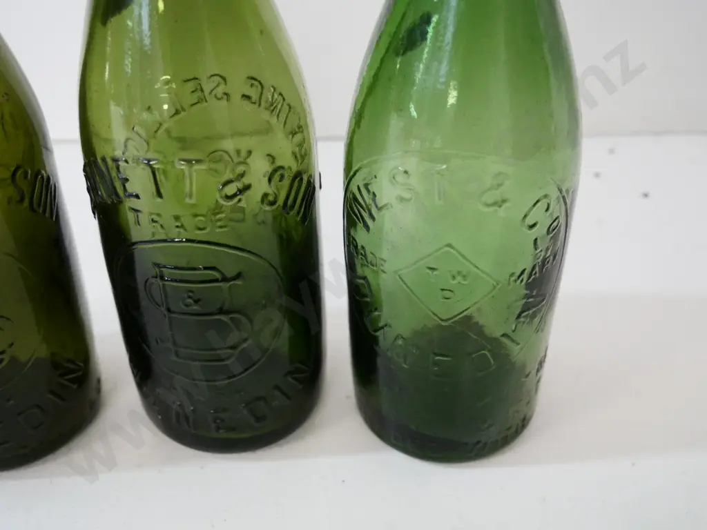 3 green drink bottles from Dunedin manufacturer's - two Bennett & Sons and one West & Co. H-240 Image 1++