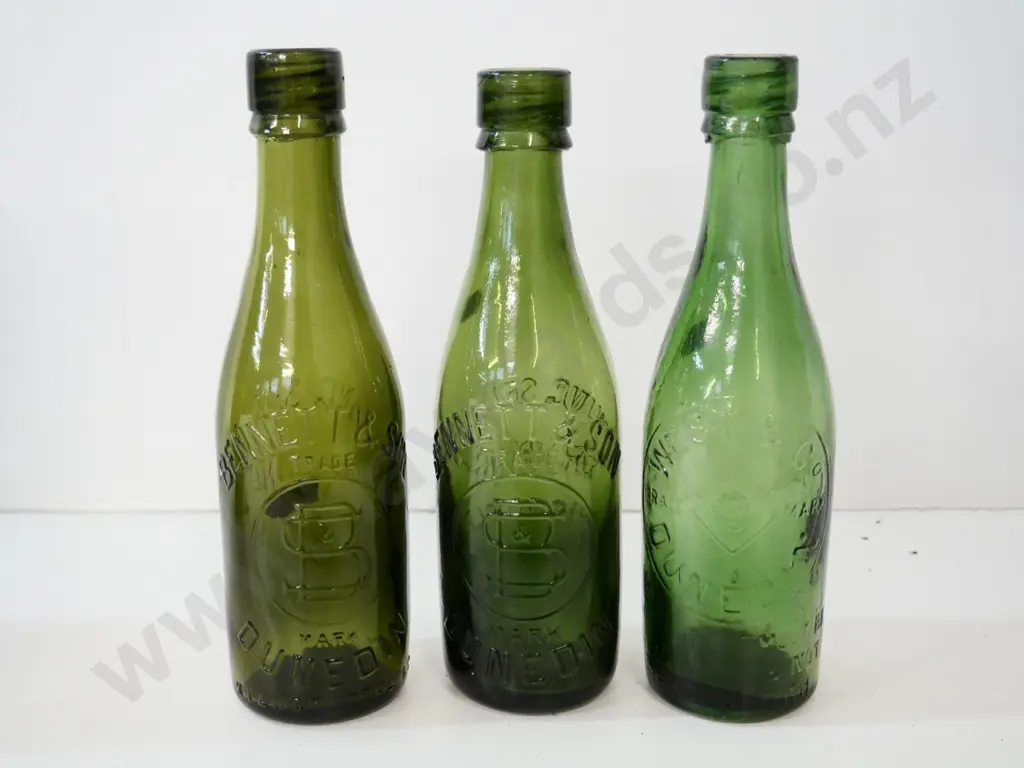 3 green drink bottles from Dunedin manufacturer's - two Bennett & Sons and one West & Co. H-240 Image 1++