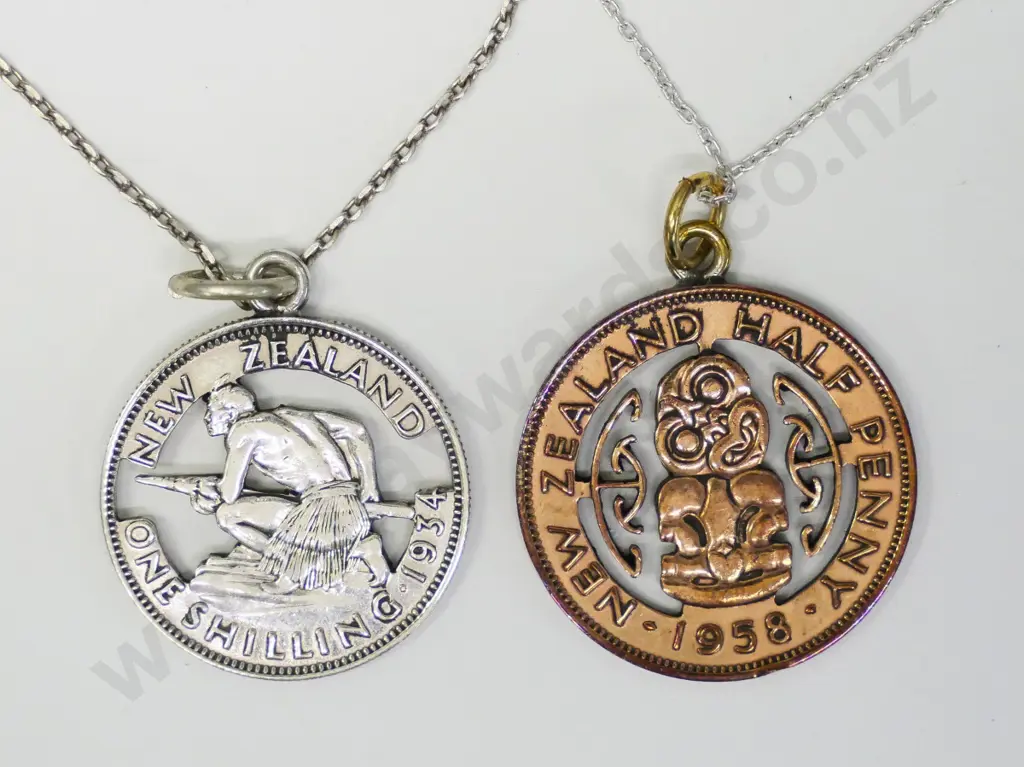 half penny cut out pendant, chain stamped 925, and a one shilling cut out pendant, chain stamped sterllng Image 1++