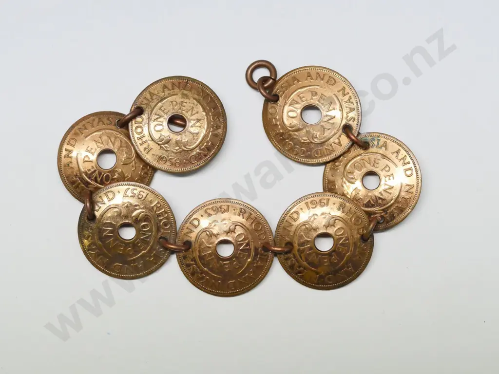 bracelet made from Rhodesia and Nyasland pennies Image 1++