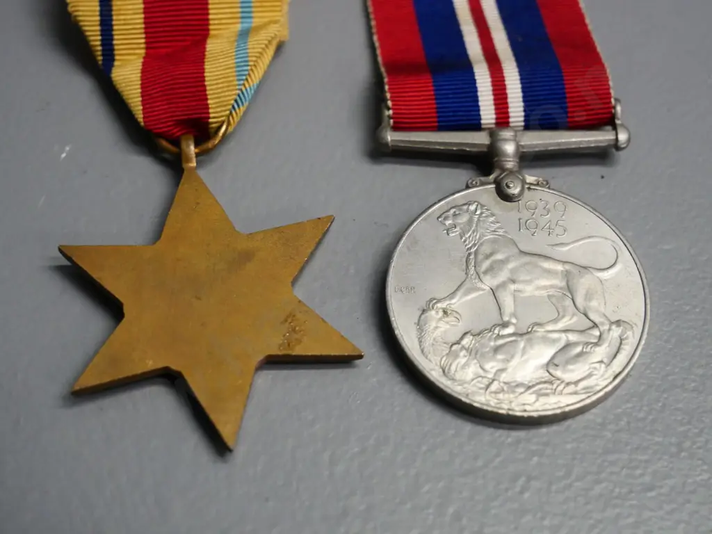 2 WWII military medals with ribbon - African star and a 1939-45 service medal Image 1++
