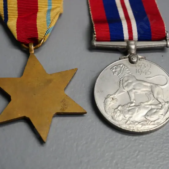 2 WWII military medals with ribbon - African star and a 1939-45 service medal