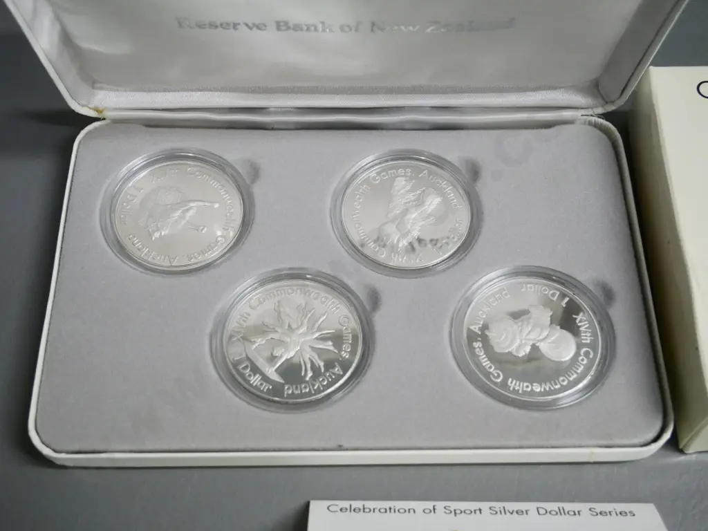 cased set of 4 New Zealand silver dollars - 1989 Celebration of Sports Image 1++