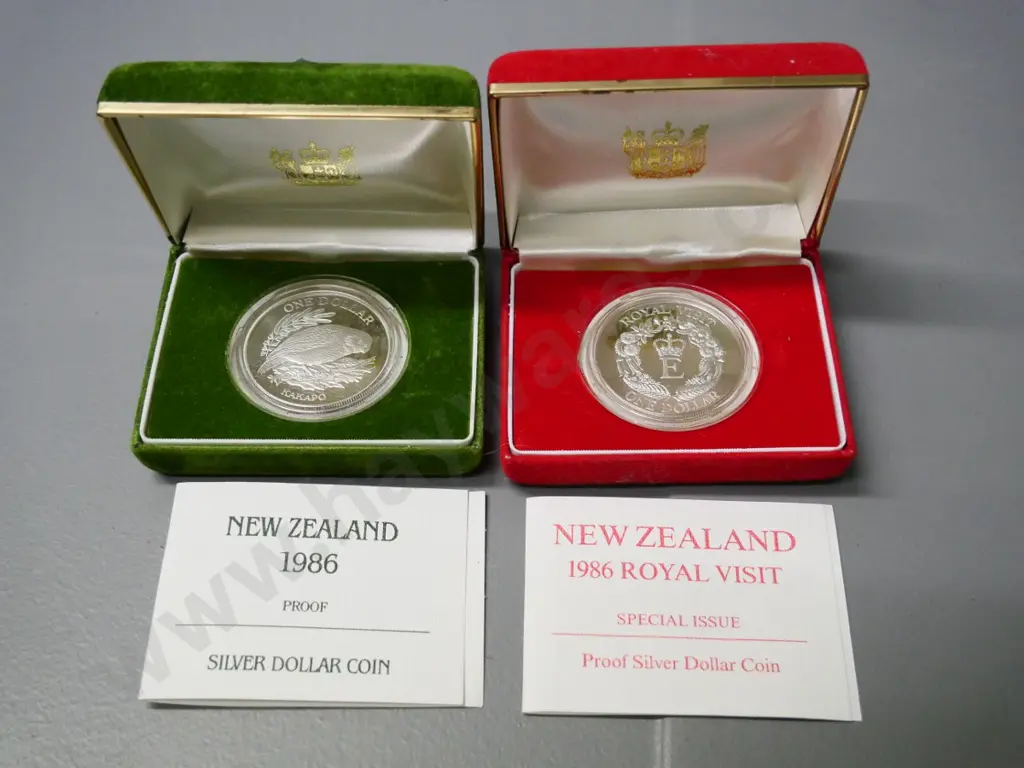 2 cased New Zealand cased 1985 proof dollar coins - kakapo and Royal Visit Image 1++