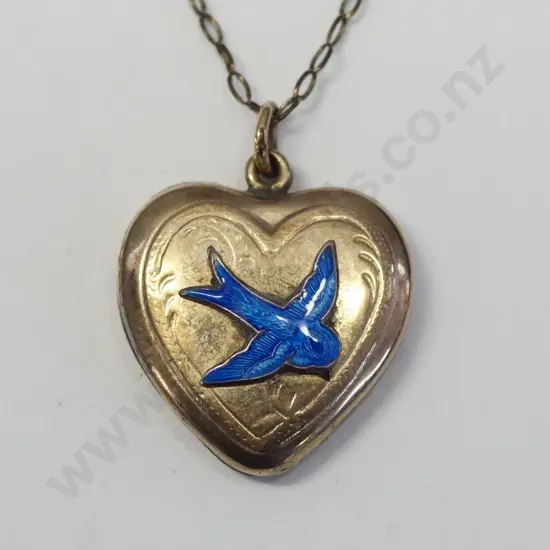 gold lined locket with blue dove stamped 9ct lnd