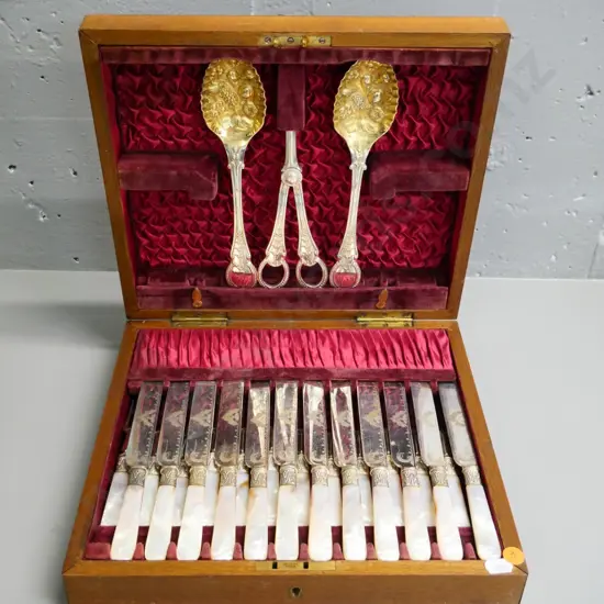 wood-cased 12-place mother-of-pearl handled dessert knives and forks, grape scissors and 2 berry spoons