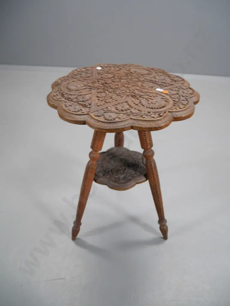 carved wood round occasional table with Persian style motifs - some movement in tripod base H-530 Diameter 370 Image 1++