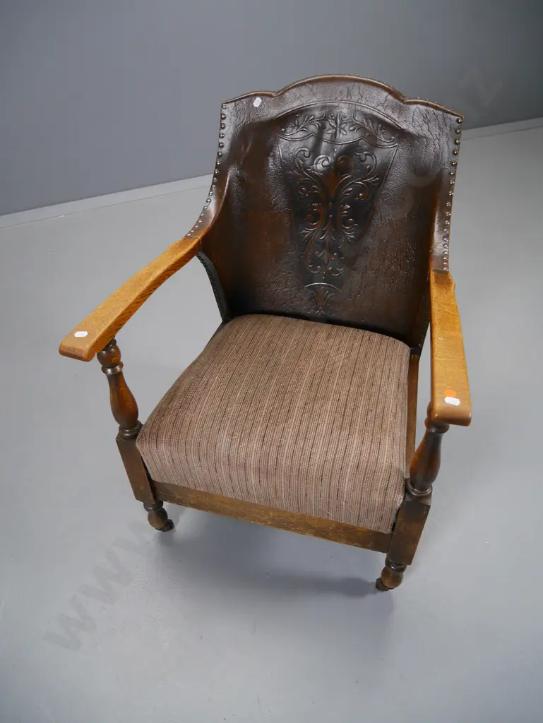 vintage oak-framed occasional chair w/ studded & pressed (leather?) back, arm needs gluing H-820 W-540 D-610 Image 1++