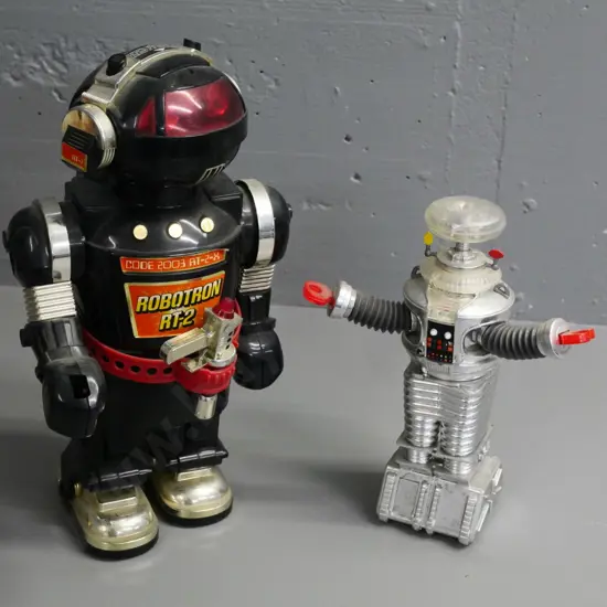 2 retro plastic robots - Robotron RT-2 H-380 & silver robot marked New Line Productions 1997 both untested
