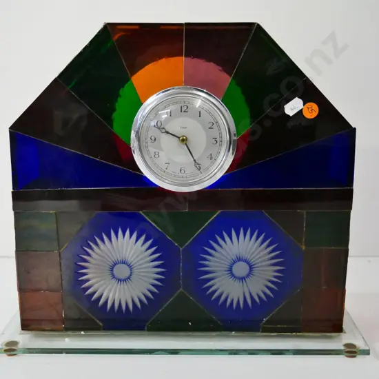 Enfield clock in coloured glass case - has remnants of electric fitting for lamp H-300 W-350 D-110