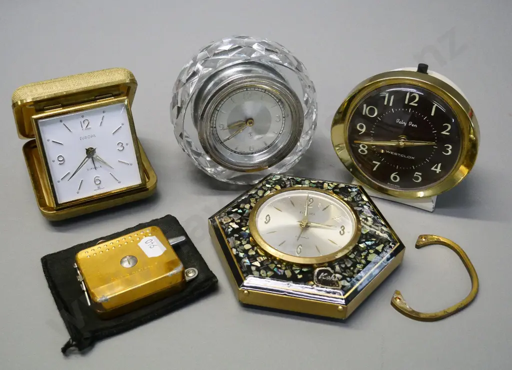4 retro small travel or bedside clocks, paua front design has broken stand, and a Henselite bowls measure Image 1++